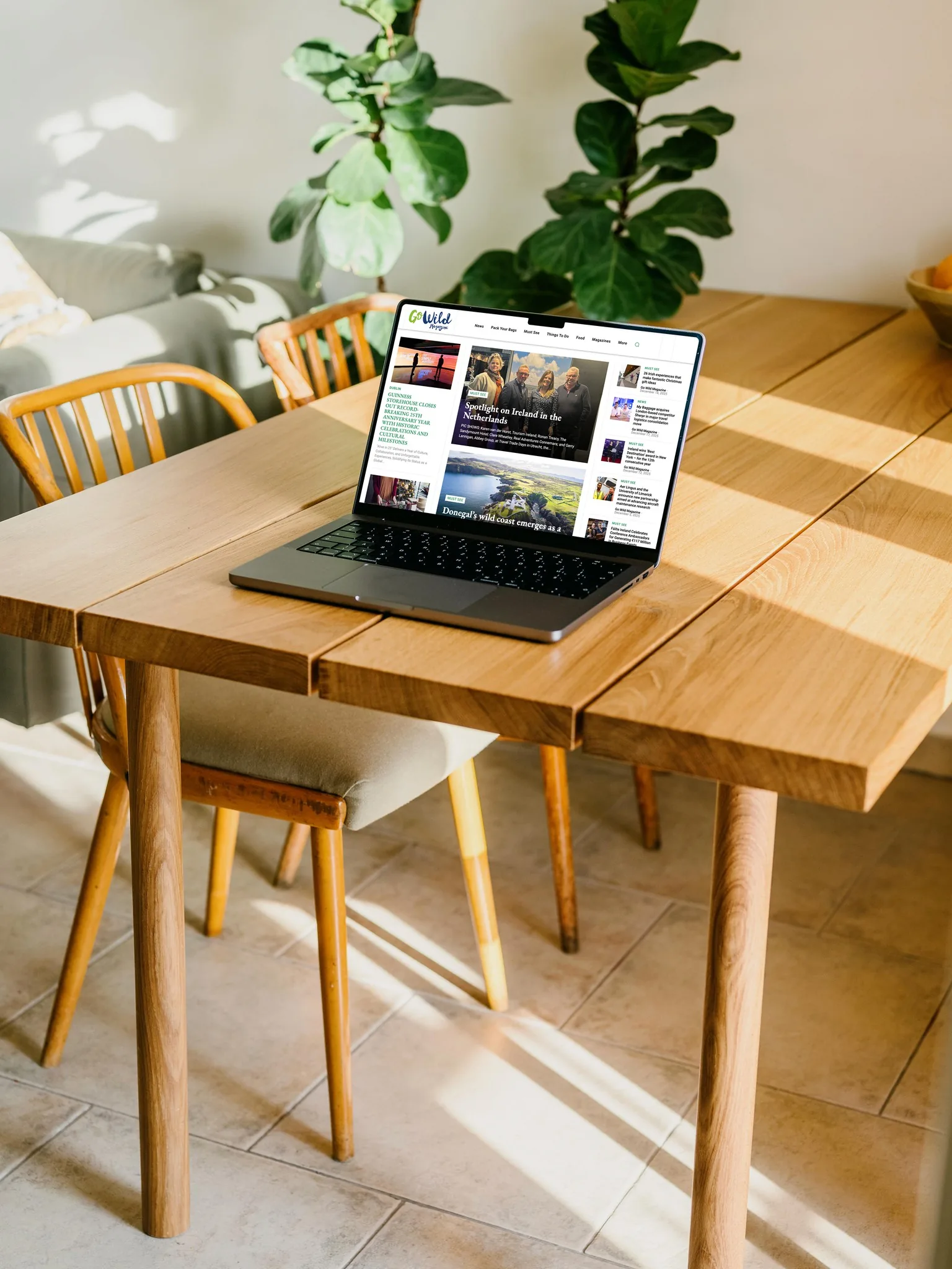 Laptop displaying a news website, showcasing website design.