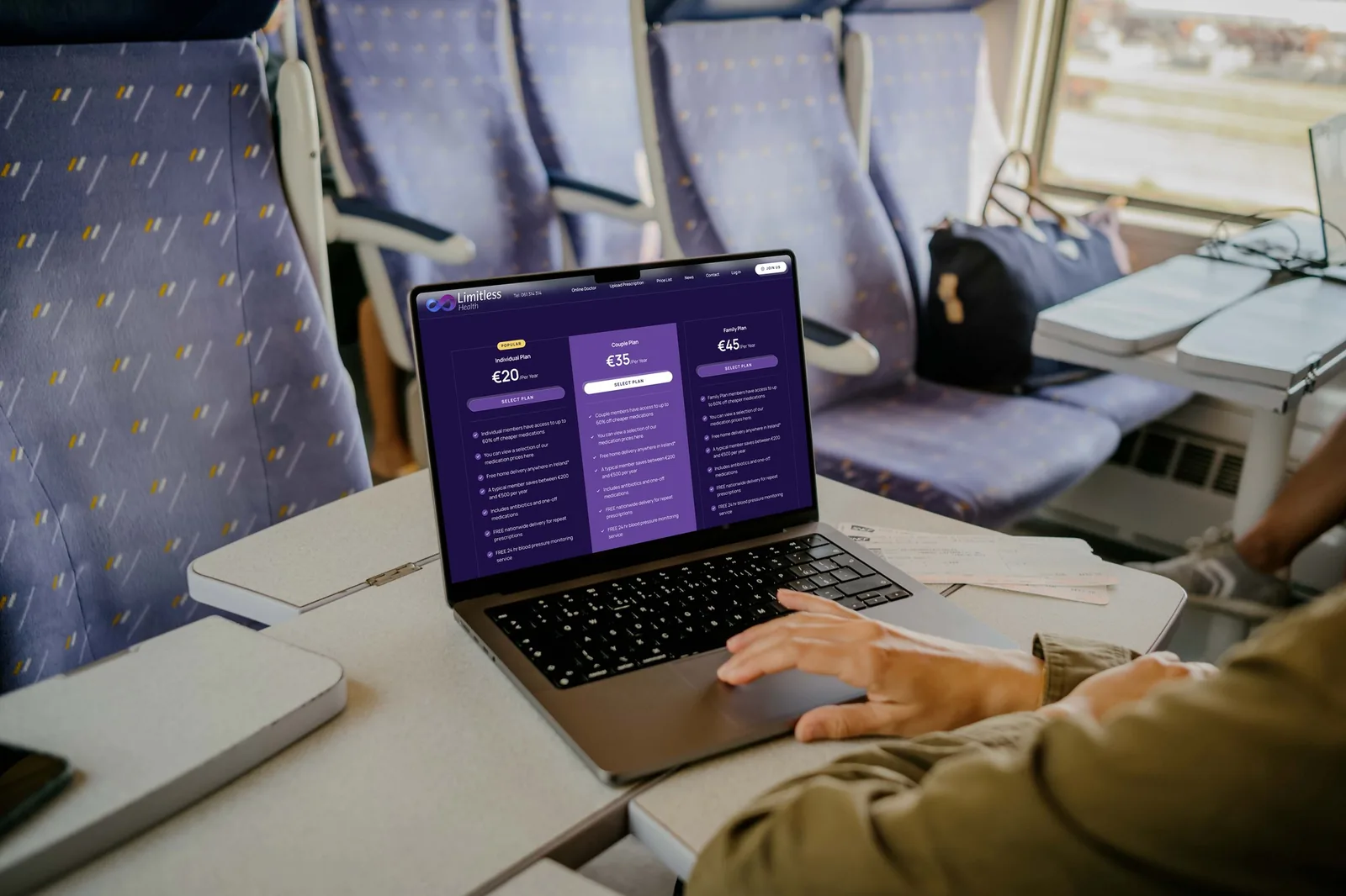 Laptop displaying service pricing plans, demonstrating website design.
