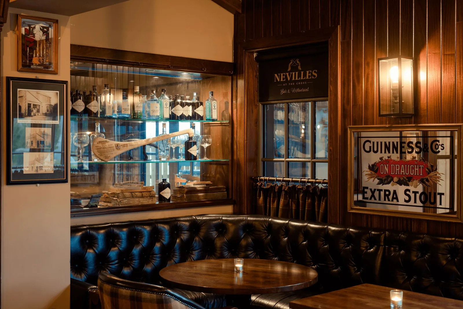Traditional pub interior with custom branding for Neville's, by branding agency the region.