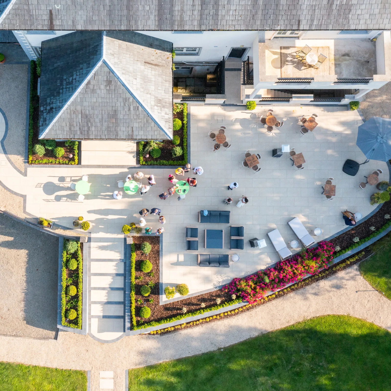 Aerial view of a lively outdoor patio at a premium venue for website design.