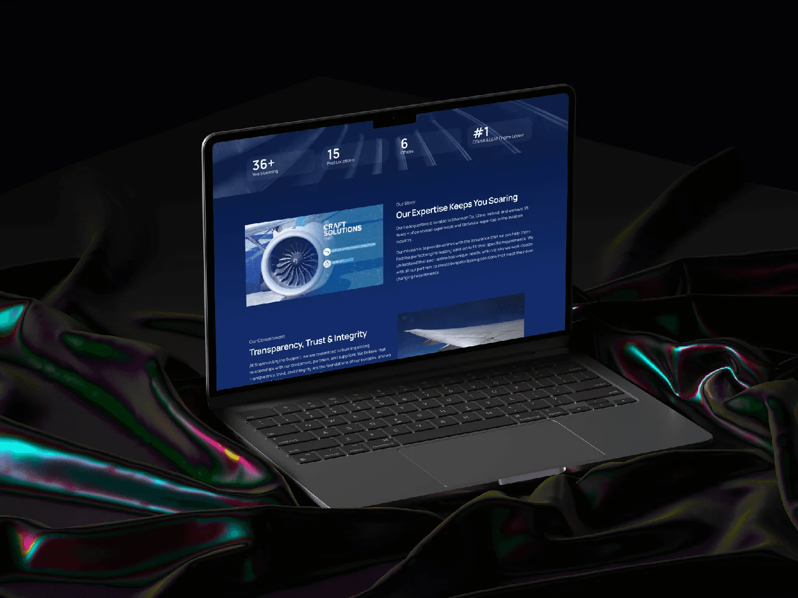 Laptop displaying a professional website design for an aviation company.
