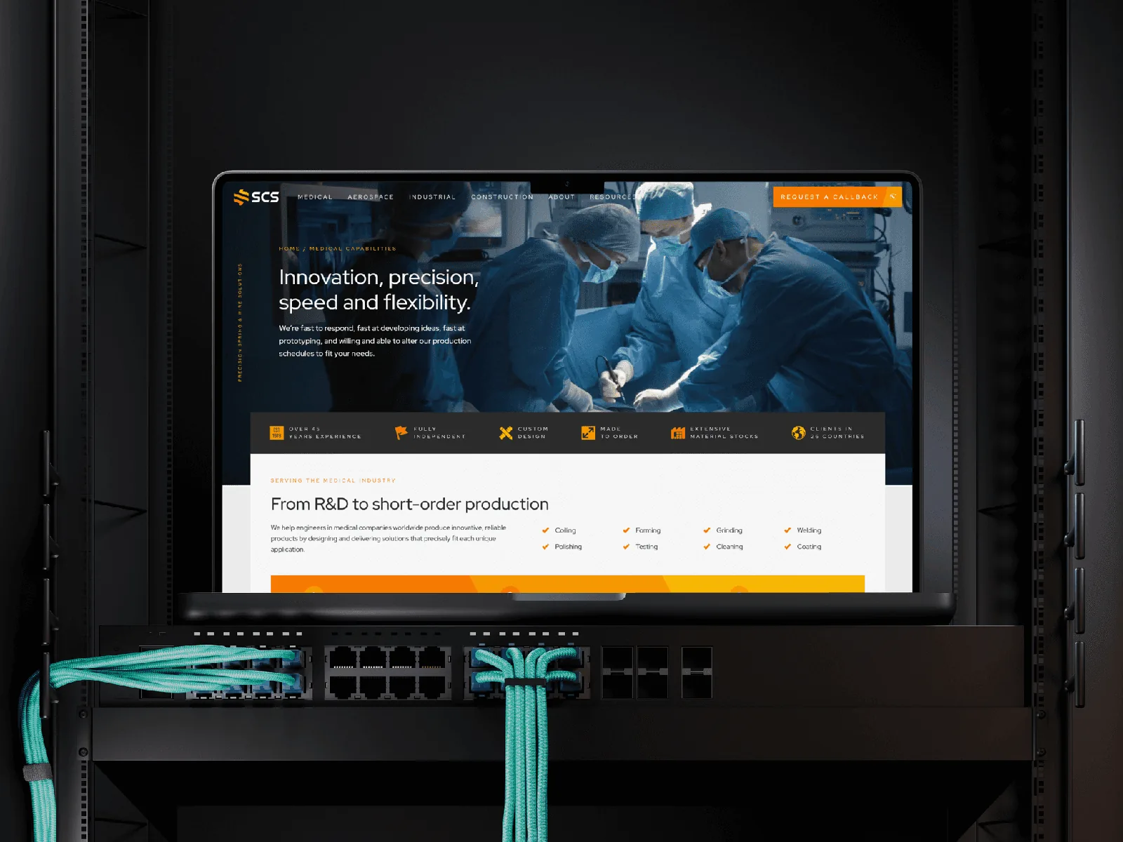 Vancouver Website Design for industrial client on laptop in server rack.